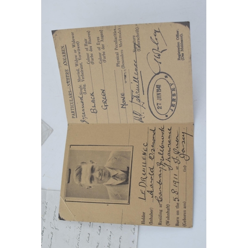 500 - A replica WWII Jersey Identity Card from the Nazi occupation of the Channel Islands together with a ... 