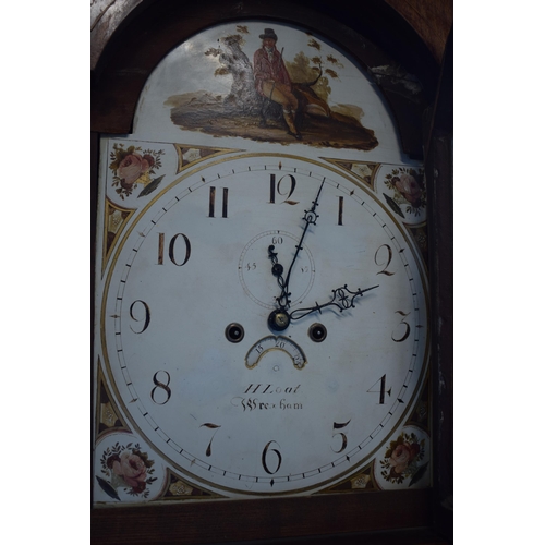 546 - An early 19th century oak and mahogany longcase clock with swan pediment, named 'H Loat of Wrexham',... 