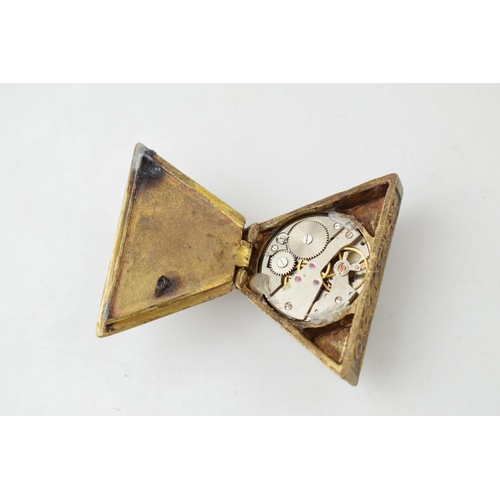 547 - Bronze style Masonic triangular clock, with top wind, 6.5cm tall, in working order, modern.