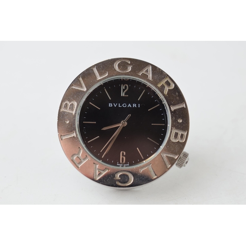 551 - BVLGARI desk clock , quartz movement, black circular dial with applied baton markers. Swiss made, wi... 