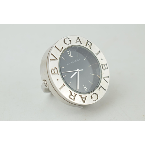 551 - BVLGARI desk clock , quartz movement, black circular dial with applied baton markers. Swiss made, wi... 