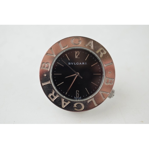 551 - BVLGARI desk clock , quartz movement, black circular dial with applied baton markers. Swiss made, wi... 