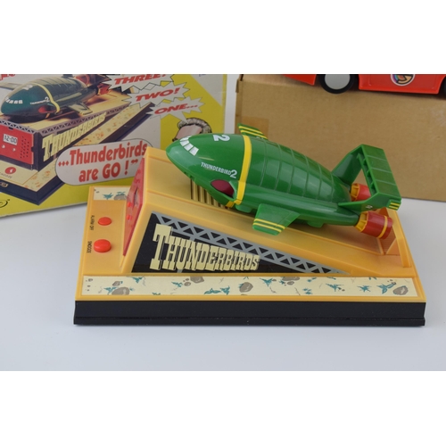 589 - A Thunderbirds talking alarm clock.Thunderbirds 2 in original box together another Captain Scarlet S... 