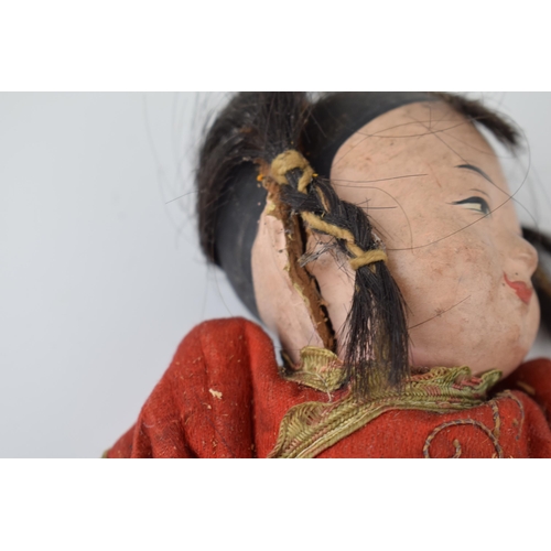 596 - A pair of Japanese dolls c1920s. Composite heads with hand-painted faces and hand-embroidered clothe... 