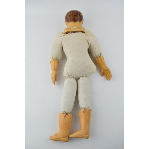 599 - Boy doll with wooden head and limbs, hand carved and hand-painted  head. c1970s. Height 54cm