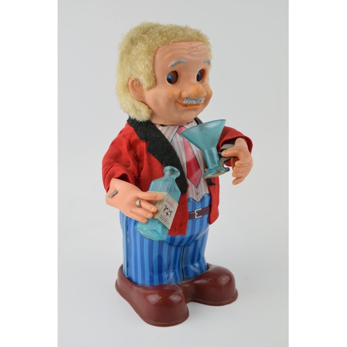 605 - Vintage 'Blushing Willy' c1960s Japan Tin Toy, Battery Operated Litho Printed. Height 17cm.