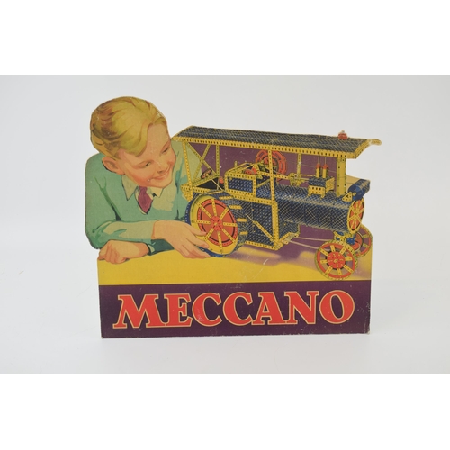 613 - A Meccano point of sale shop advertising display depicting a boy playing with a Meccano traction eng... 