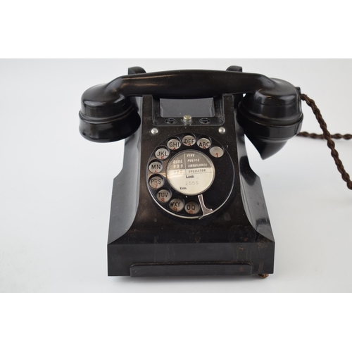 624 - Vintage black Bakelite telephone with Leek dial code to centre, unconverted.