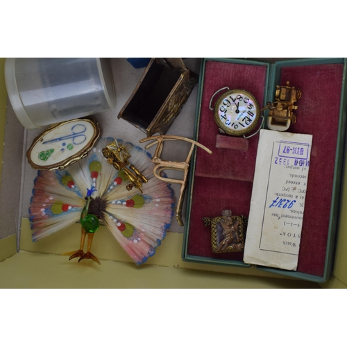 630 - A mixed collection of items to include a reel of film from Princess Margarets wedding, an Aynsley mi... 