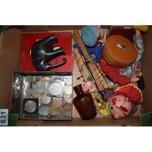 631 - A mixed collection of items to include mixed UK currencies, Pelham puppets, OXO tin, antique poison ... 