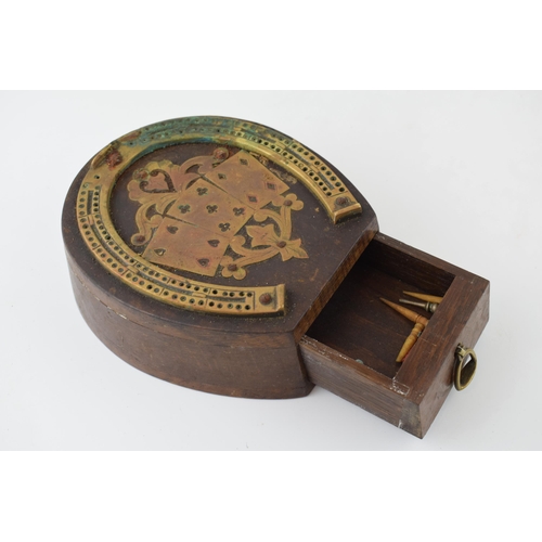 632 - A late 19th / early 20th century gaming board with brass horse shoe, game markers and drawer. Dimens... 