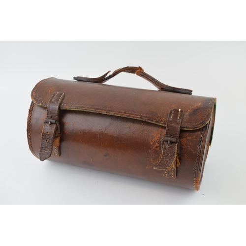 635 - A set of vintage lignum vitae bowl in original leather carry case.