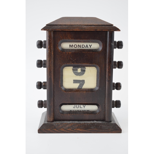 637 - Early 20th century wooden perpetual calendar with scrolls to include days of the week, dates and mon... 