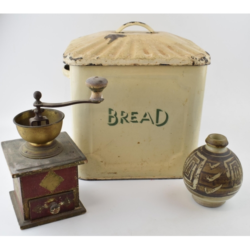 648 - An original vintage enamel bread bin with green writing together with a studio pottery stoneware vas... 