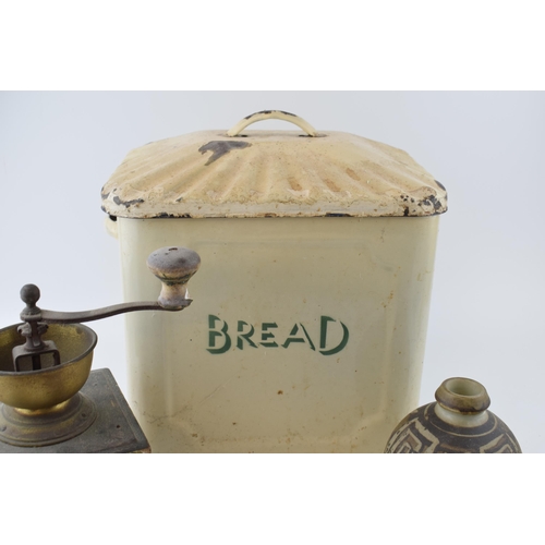 648 - An original vintage enamel bread bin with green writing together with a studio pottery stoneware vas... 