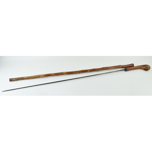 657 - A 19th century Wilkinson Sword Stick marked Wilkinson 27, Pallmall to blade. Length 88.5cm.