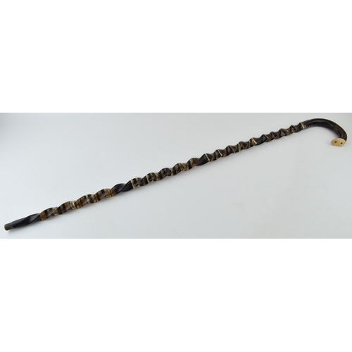 663 - A handmade horn walking stick made in Alton Staffordshire. Constructed from horn sections arranged i... 