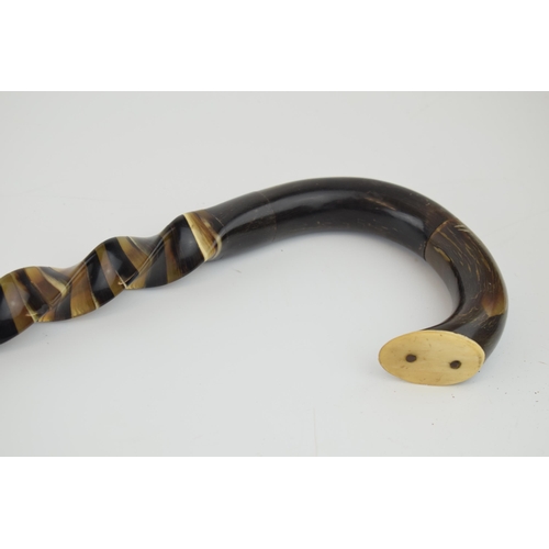 663 - A handmade horn walking stick made in Alton Staffordshire. Constructed from horn sections arranged i... 