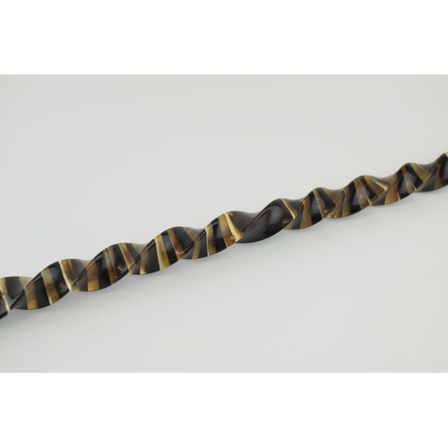 663 - A handmade horn walking stick made in Alton Staffordshire. Constructed from horn sections arranged i... 