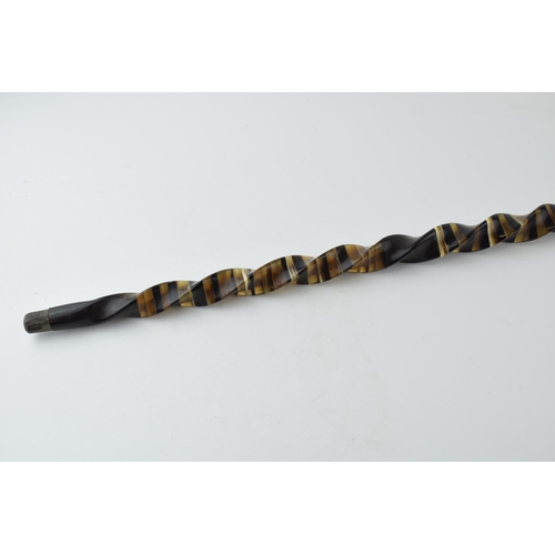 663 - A handmade horn walking stick made in Alton Staffordshire. Constructed from horn sections arranged i... 