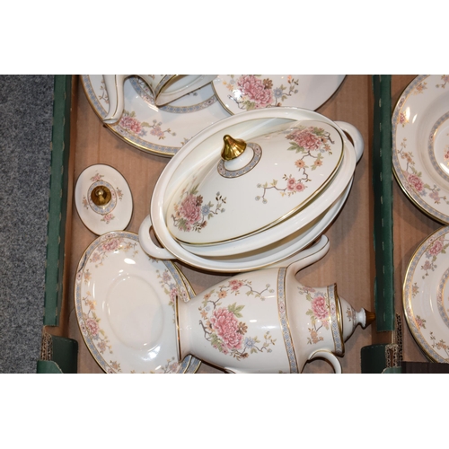 205 - Royal Doulton dinner ware in the Canton pattern to include coffee pots, a tureen, bowls, plates and ... 