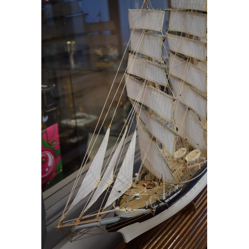 581 - Kit built model of a sailing vessel / galleon, with German flag, mounted onto wooden stand, mostly i... 