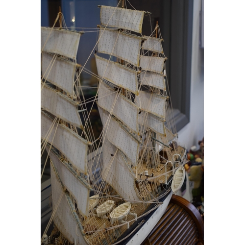 581 - Kit built model of a sailing vessel / galleon, with German flag, mounted onto wooden stand, mostly i... 