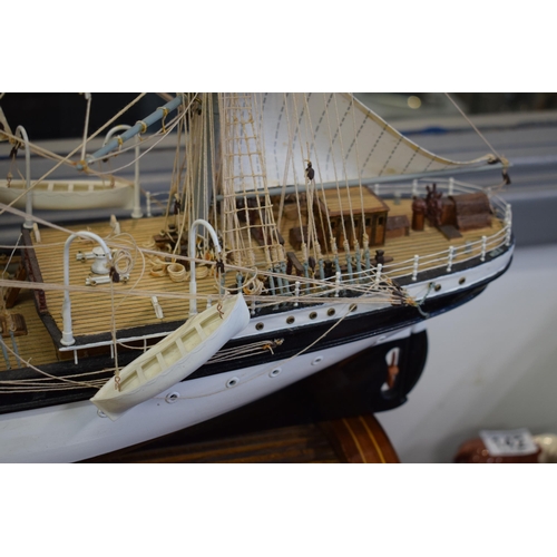 581 - Kit built model of a sailing vessel / galleon, with German flag, mounted onto wooden stand, mostly i... 