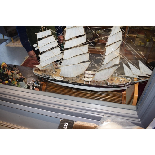 581 - Kit built model of a sailing vessel / galleon, with German flag, mounted onto wooden stand, mostly i... 