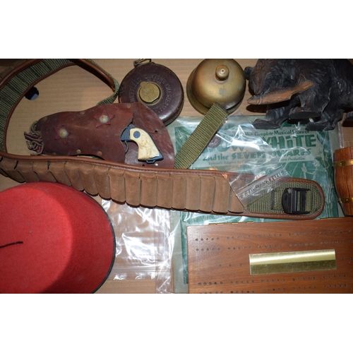 643 - A mixed collection of items to include Black Forest bear style bear, vintage cowboy guns and holster... 