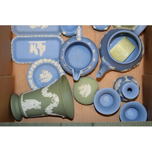 261 - A collection of Wedgwood Jasperware items in blue and green to include pin trays lidded pots, teapot... 