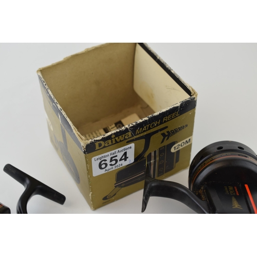 654 - Two Daiwa Harrier 120M Graphite Match reels, close face, one in original box. (2)