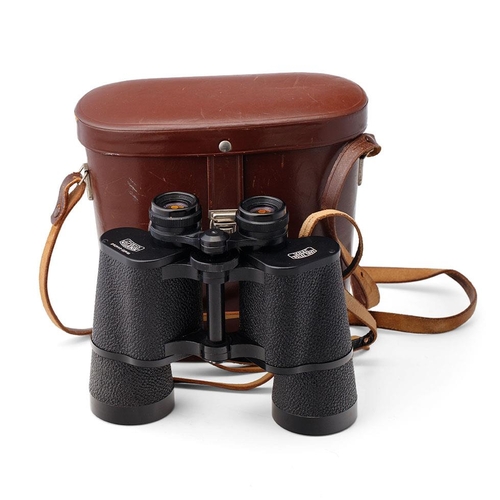 137 - A cased pair of Carl Zeiss Jena Jenoptem 10x50 binoculars.