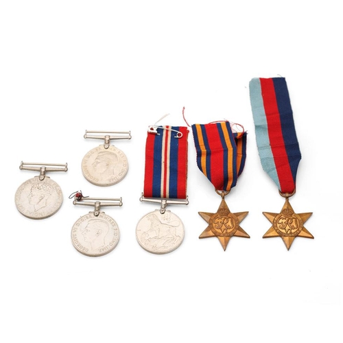 160 - Two groups of WWII medals to include The Defence Medal (2) one with original ribbon, 1939 - 1945 med... 