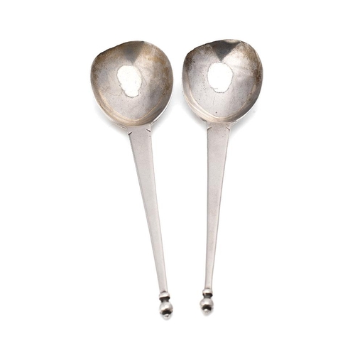 200 - Arts and Crafts style silver spoons, a pair, Hallmarked London 1899 'M & W'. 20cm. Weight 95.9 grams... 