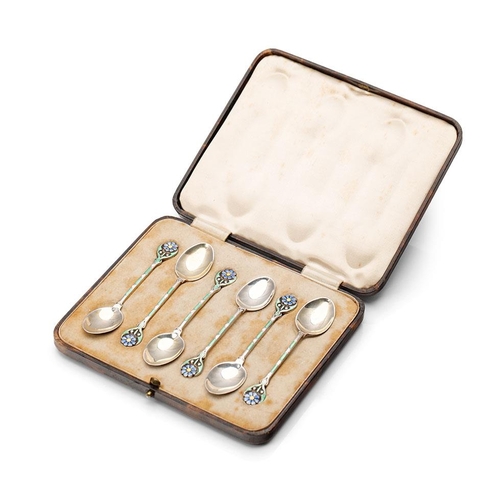 208 - A stunning cased set of hallmarked silver tea spoons with enamelled decoration in the form of flower... 