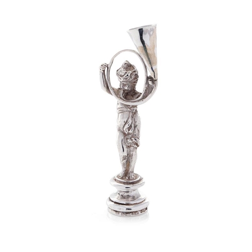 213 - A late 19th century silver figural desk seal, import marks for Berthold Muller, 9cm tall.