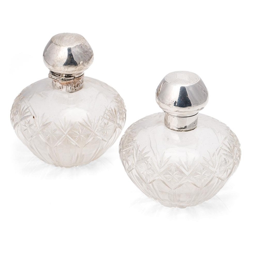 248 - A pair of matching silver topped cut glass perfume bottles, Birm 1923, Levi & Salaman (2), 10cm tall... 