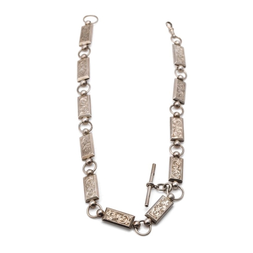 295 - White metal (tests as silver) albert chain with ornate rectangular links with engraved floral decora... 