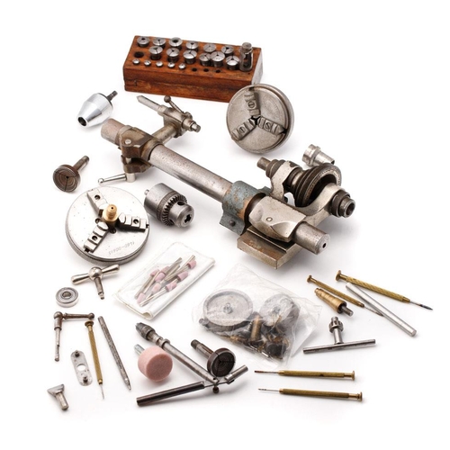 330 - Wolf Jahn watchmaker's lathe, collet set and chucks together with attachments. 25cm.