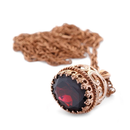 369 - 9ct rose gold fob, set oval-cut garnet, on fine 9ct chain (clasp af), total weight 9.9 grams.