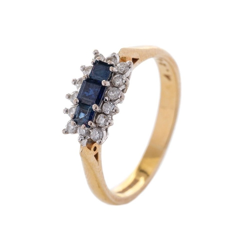 372 - 18ct sapphire and diamond ring with three square-cut sapphires surrounded by 14 diamonds, size P/Q, ... 