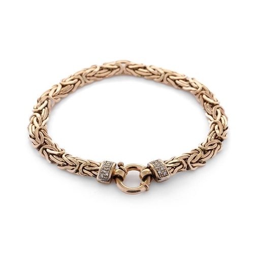 375 - 9ct yellow gold fancy link bracelet, highlighted with white stone collars, 10.9 grams, 19.5cm long.