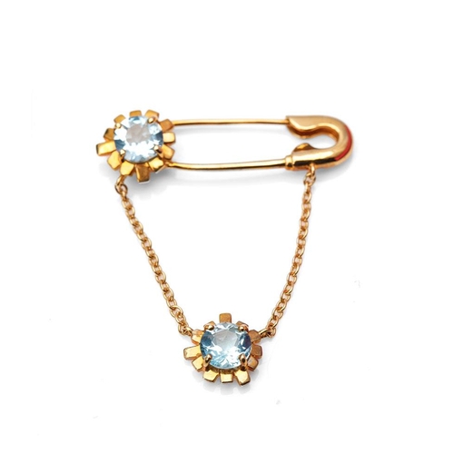 376 - 9ct gold 'Zandra Rhodes' blue topaz pin brooch with drop chain, set further blue topaz, with box and... 