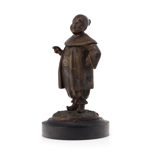 86 - Bronze figure of a Chinese gentleman in traditional costume, mounted onto slate base, in the form of... 