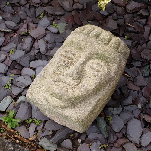 Antique carved stone head Of Royal or Religious figure appears to have once been recessed into a building possibly a church and is substantial in weight, 34cm tall.