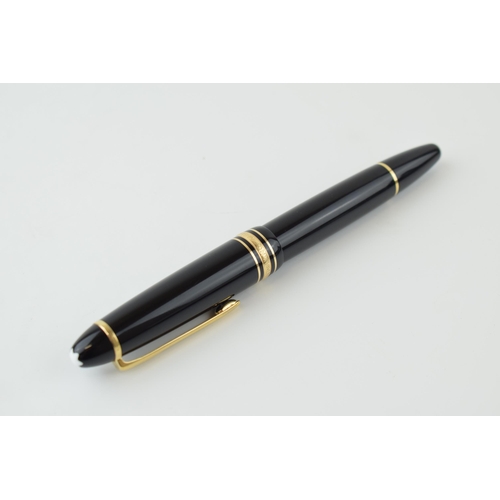 134 - A Montblanc Meisterstuck 146 Fountain Pen in black with one broad and two narrow gold bands, 14ct bi... 