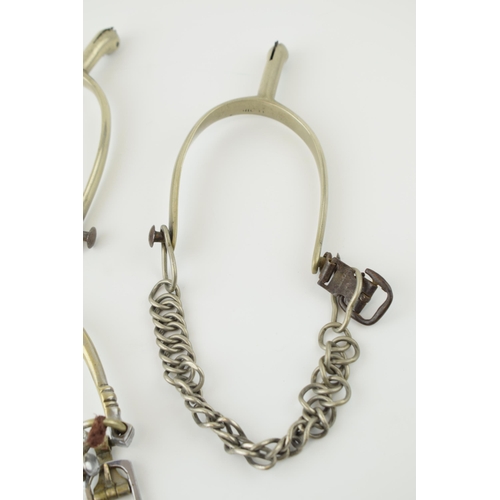 163 - A pair of nickel plated cavalry officers spurs together two antique individual metal spurs, a matche... 