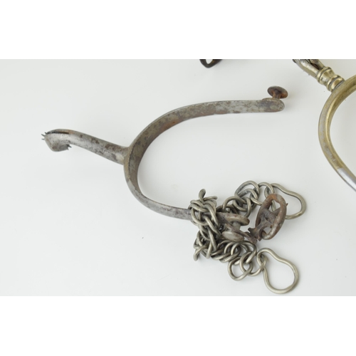 163 - A pair of nickel plated cavalry officers spurs together two antique individual metal spurs, a matche... 