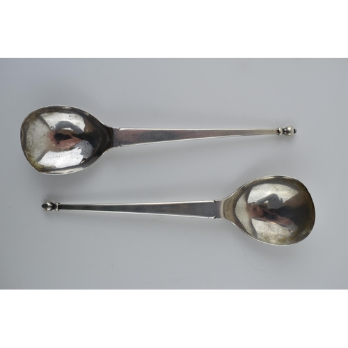 200 - Arts and Crafts style silver spoons, a pair, Hallmarked London 1899 'M & W'. 20cm. Weight 95.9 grams... 